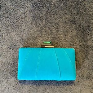 LIKE NEW turquoise clutch with strap